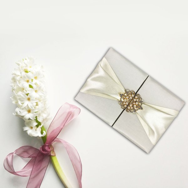 Crown-Adorned Pearl Ivory Silk Pocket Folder with Cream Sash